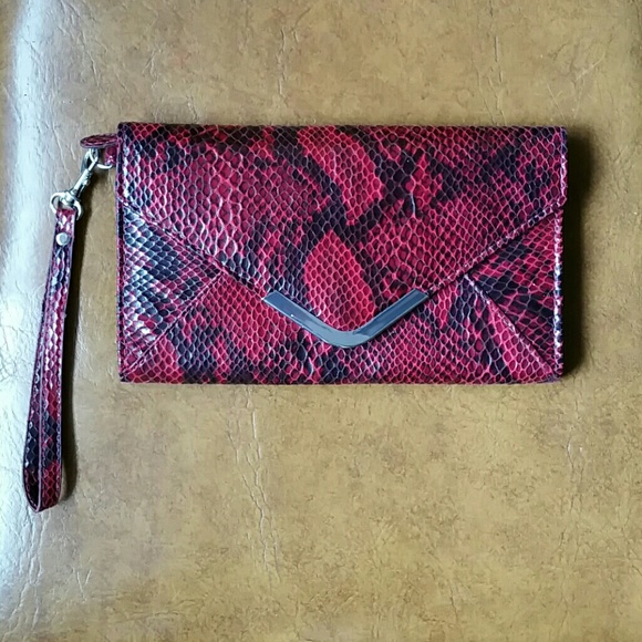 Red animal print wristlet clutch