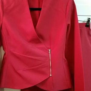 Ruby red skirt and jacket suit.