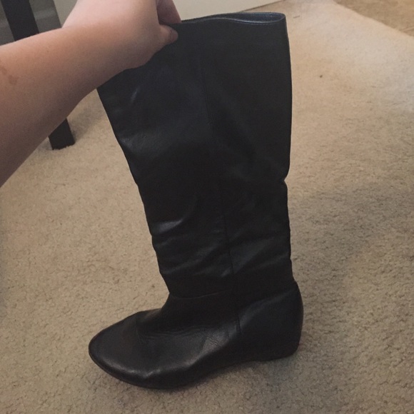 Tall black zip boots