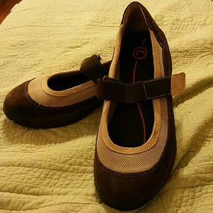 Rockport Shoes. Run slightly large. Super comfy!