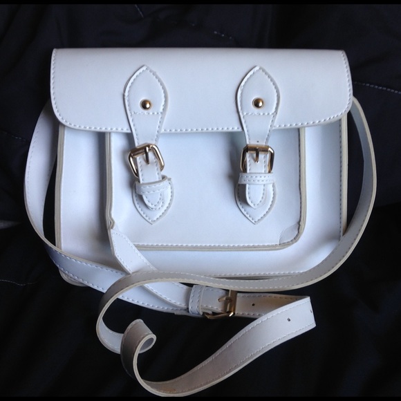 A white faux leather satchel.