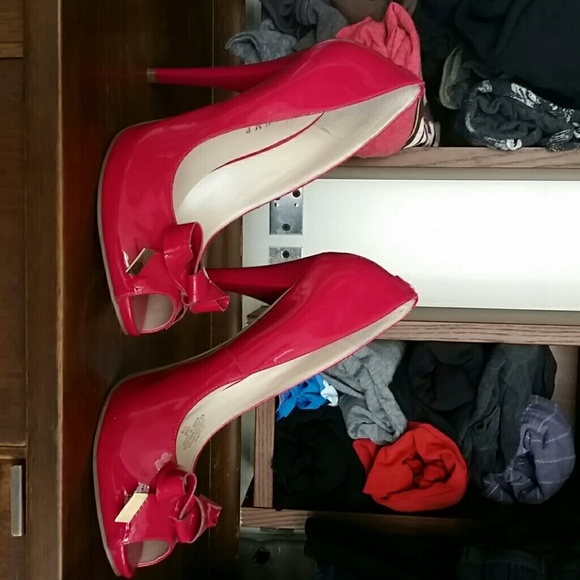 Ivanka Trump hot pink peep toe pumps