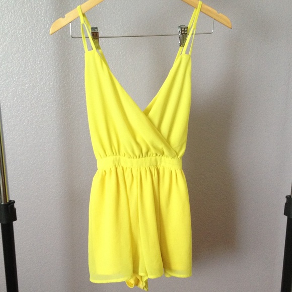 Bright yellow romper from Naked Wardrobe