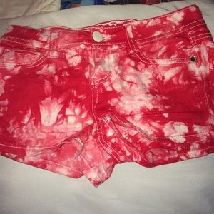 Red and white tie die shorts
