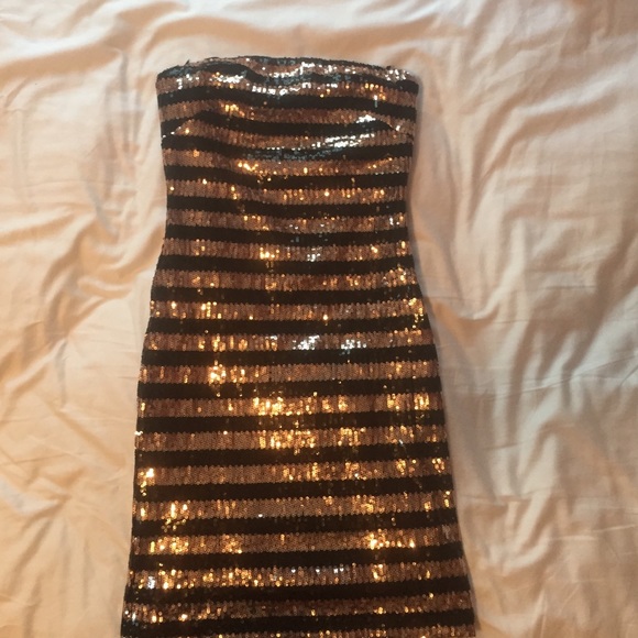 Gold and black sequin dress