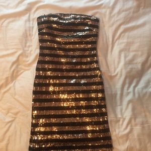 Gold and black sequin dress