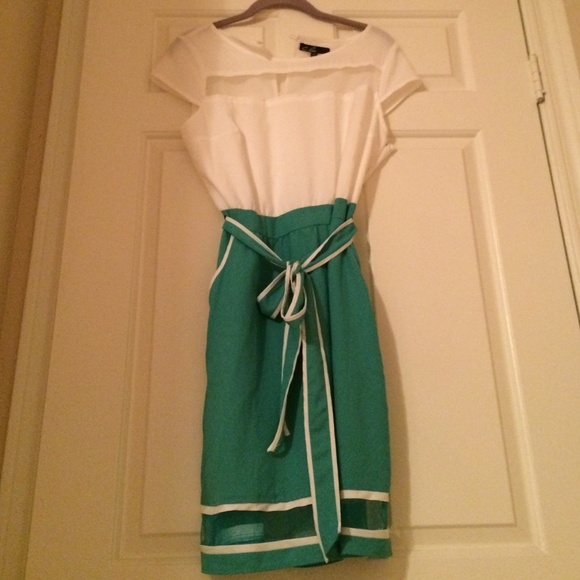 Teal and white dress with tie. C. Luce.