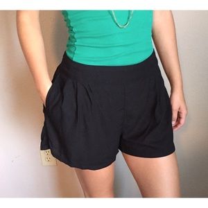 American eagle black float shorts