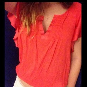 Orange flowy blouse