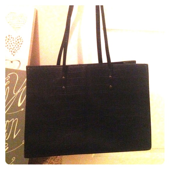 Gently used Wilson's Leather laptop/messenger bag.