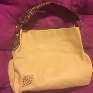 Betsey Johnson beige leather handbag floral strap.