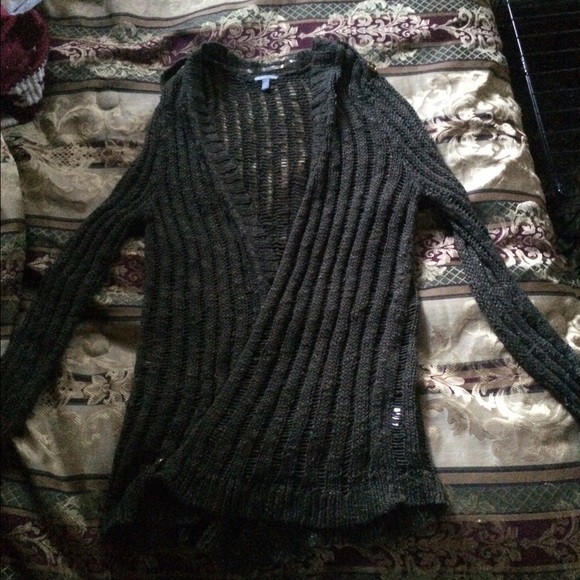 Very holy😅dark green cardigan!