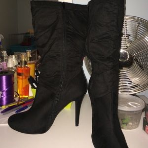 Black high heeled boots size 10