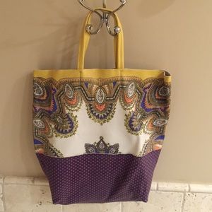 Printed leather tote bag from Anthropologie.
