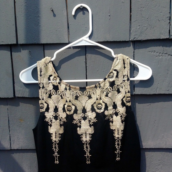 Dresses & Skirts - Unique little black dress!!