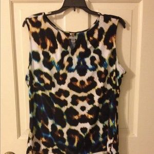 Worn a couple if times sleeveless top