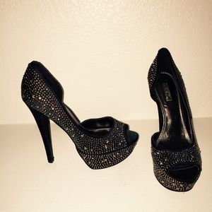 Black stilledo  covered with crystal studs