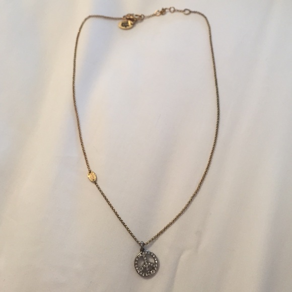 Juicy Couture two-tone peace sign necklace