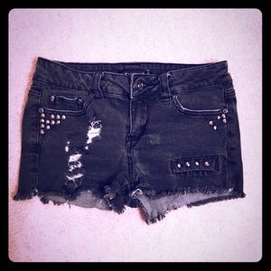 Studded distressed mid rise shorts