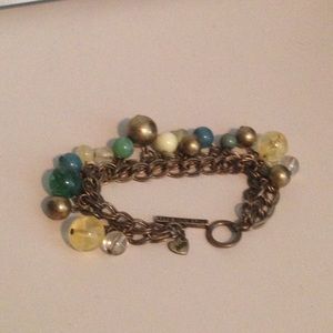 Rusted gold dangle bracelet