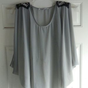 Edgy goddess top