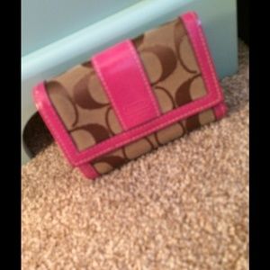 Pink and tan Coach wallet