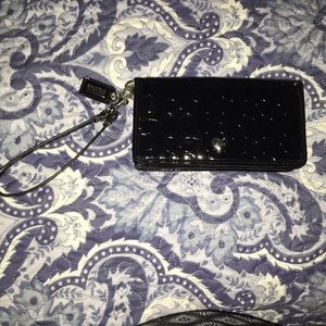 Shiny black Coach wristlet/wallet