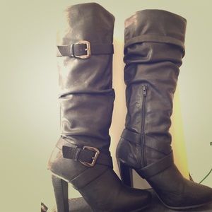 Black Carlos Santana knee high boots