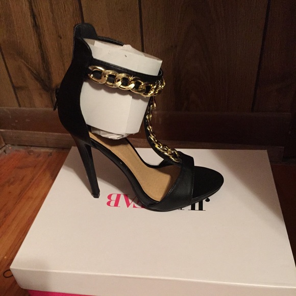 Black and gold heels, brand new