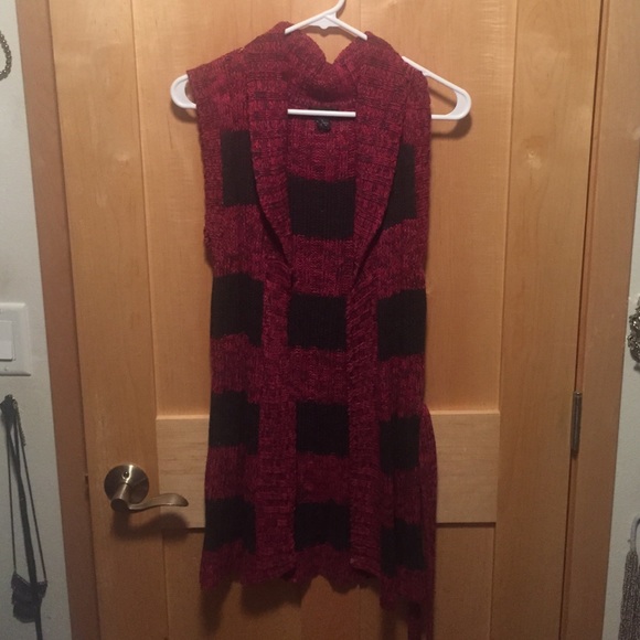 sweater vest that includes sash