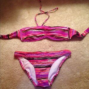 Bikini top is small bottoms are medium.