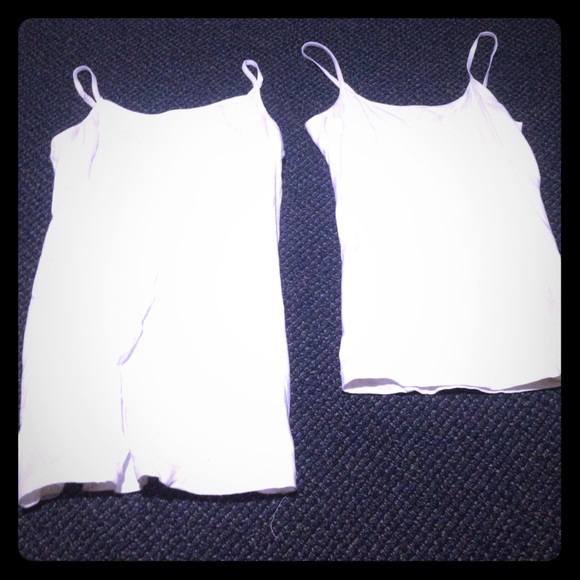 Two white tank tops!