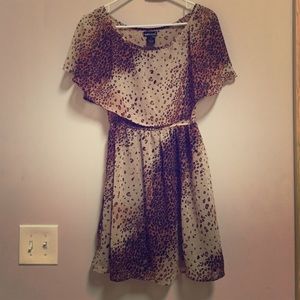Polyester, sheer, cheetah print dress.