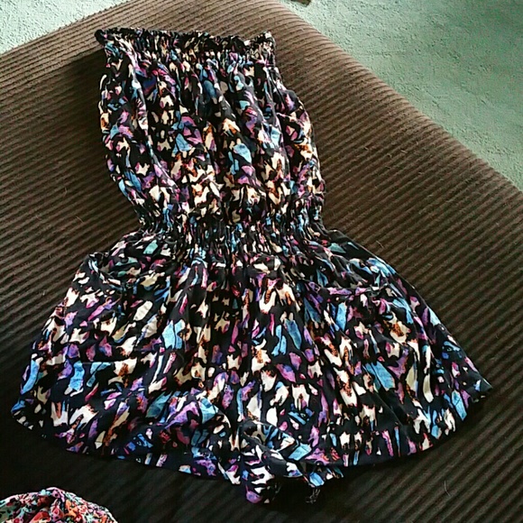 Romper with pockets in front and back