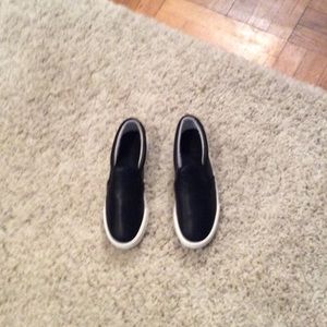 Black slip on sneakers
