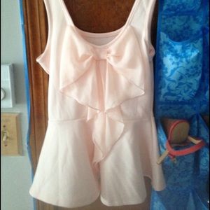 Light pink peplum top with bow