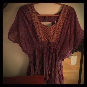Free People Bohemian top with waist draw string.