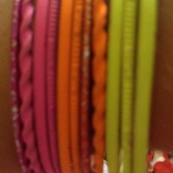 11 pink orange and yellow bracelets - Picture 2 of 2