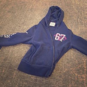 Female navy colored sweater