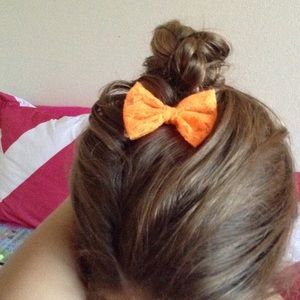Neon orange lace clip on bow