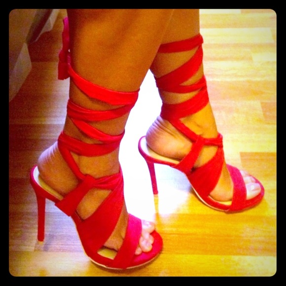 Red strapped sandals.