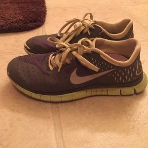 Grey and neon Nike free run shoes