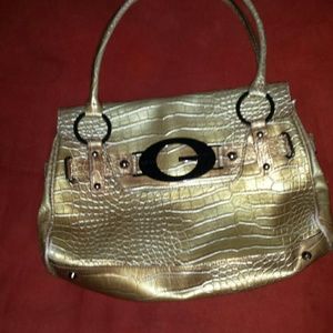 Gold guess purse