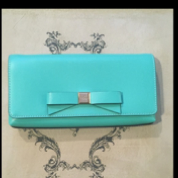Nwt authentic Kate spade clutch