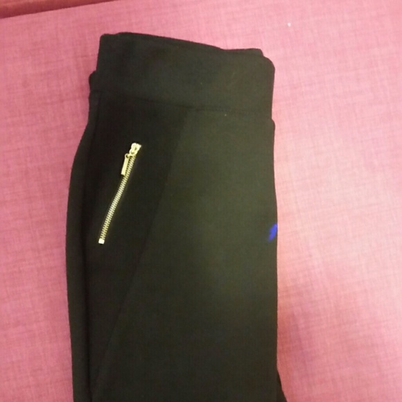 Black high waisted leggings with zip detail
