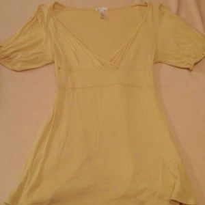 Yellow form fitting fashion top