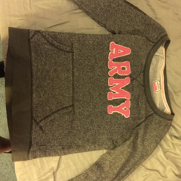 A grey and pink sweater