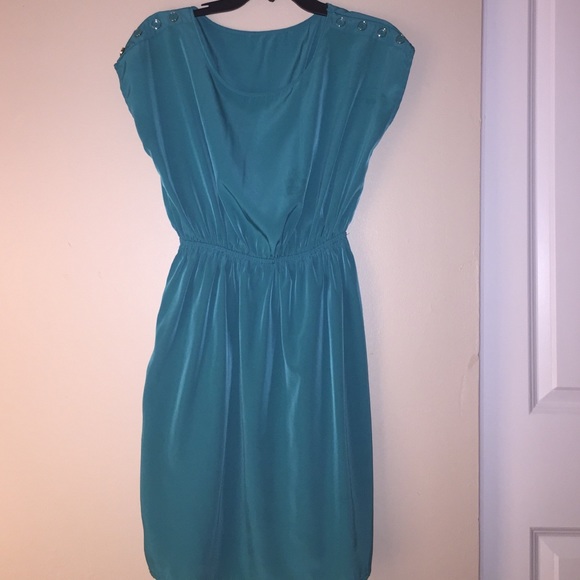 Turquoise dress with button detail