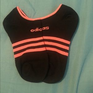 Orange and black Adidas socks.