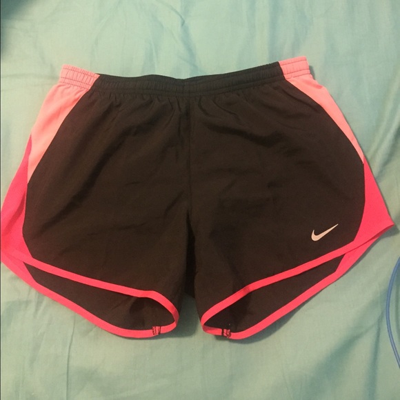 Pink and black nike dri fit shorts.